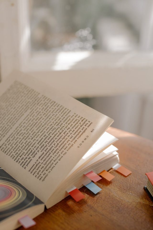photo by cottonbro studio White Book Page on Brown Wooden Table